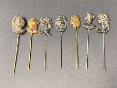 SEVEN VARIOUS BASE METAL PORTRAIT STICK PINS&nbsp;
