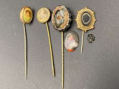 FOUR VARIOUS PORTRAIT, BASE METAL STICK PINS&nbsp;