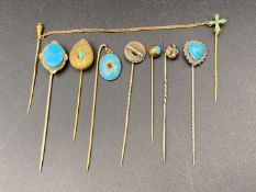 SEVEN VARIOUS SILVER, GILT AND BASE METAL STICK PINS