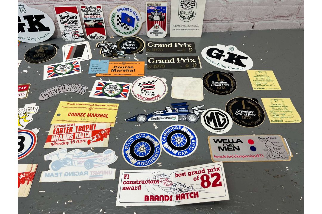 Summary:Folder Containing a Quantity of 1970/80's Formula 1 Race Stickers