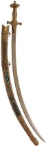 A 19TH CENTURY WOOTZ DAMASCUS BLADED INDIAN TULWAR,