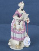 „Corine“ aus der Commedia dell'Arte. Nymphenburg 20. Jh. Porzellan, aufwendig bemalt und gold gesäu