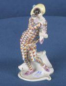 „Mezzetino“ aus der Commedia dell'Arte. Nymphenburg 20. Jh. Porzellan, aufwendig bemalt und gold ge