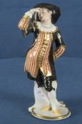 „Dottore“ aus der Commedia dell'Arte. Nymphenburg 20. Jh. Porzellan, aufwendig bemalt und gold gesä