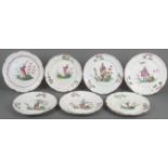 Sieben Teller. Frankreich. Fayence, bunt bemalt mit chinesischem Dekor, ohne Marke, D=23 bis 23,5 c