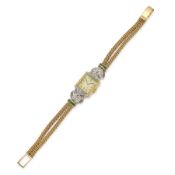 MONTRE EN OR, ÉMERAUDES ET DIAMANTS