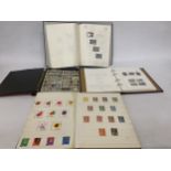 A COLLECTION OF STAMP ALBUMS