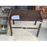 A METAL PLANT BENCH/ TRIVET STAND