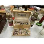 A LARGE ASSORTMENT OF COSTUME JEWELLERY TO INCLUDE RINGS, WATCHES, BRACELETS, BANGLES ETC