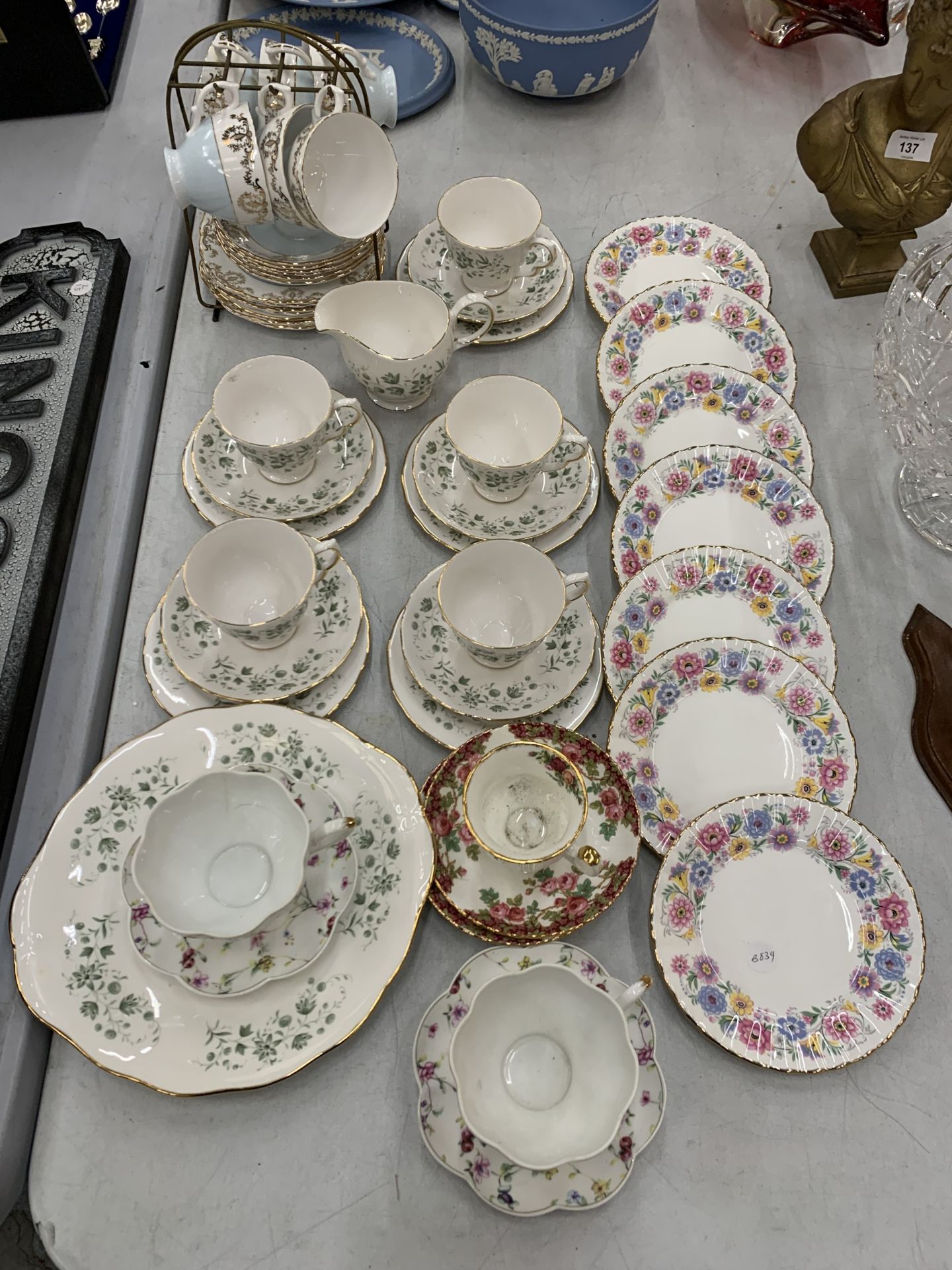A LARGE ASSORTMENT OF TEA WARE TO INCLUDE CUPS, SAUCERS, TRIO'S, CAKE PLATES ETC AND INCLUDING ROYAL