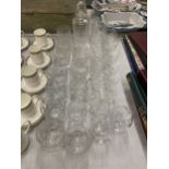 A LARGE COLLECTION OF CUT GLASSWARE TO INCLUDE WINE GLASSES, TUMBLERS, PITCHERS, DECANTER ETC