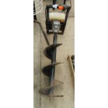 A PETROL POST HOLE BORER NO VAT