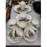 AN ASSORTMENT OF ARGYLE TEA SET PIECES WITH A HUNT DECORATION TO INCLUDE CAKE PLATES, CUPS AND