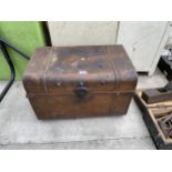 A VINTAGE METAL TRAVEL TRUNK