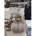 A VINTAGE CAST IRON GARDEN ROLLER