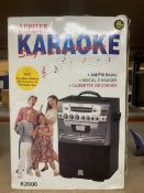 AN ARBITER KARAOKE SING AND SONG MACHINE