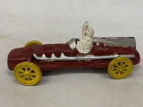 A CAST MODEL OF A MICHELIN MAN AND CAR, LENGTH 16CM