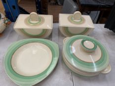 FOUR PIECES OF CLARICE CLIFF POTTERY TO INCLUDE TWO BIZARRE LIDDED SERVING DISHES