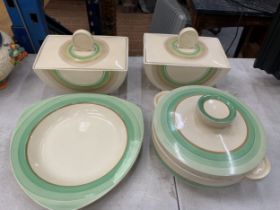 FOUR PIECES OF CLARICE CLIFF POTTERY TO INCLUDE TWO BIZARRE LIDDED SERVING DISHES