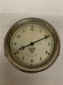 A VINTAGE 1930'S SMITH'S CAR DASHBOARD CLOCK, WITH A WHITE DIAL AND BLUE HANDS, MADE BY THE