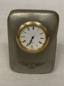 A VINTAGE PEWTER BENTLEY CLOCK