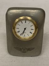 A VINTAGE PEWTER BENTLEY CLOCK