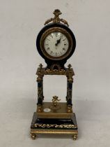 A BRASS AND ENAMEL MANTLE CLOCK, CHIMES ON THE QUARTER HOUR