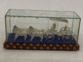 A SILVER WIRE MODEL OF A CARRIAGE AND HORSES IN A GLASS CASE