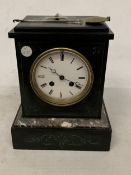 A VINTAGE FRENCH SLATE MANTLE CLOCK WITH PENDULUM AND KEY