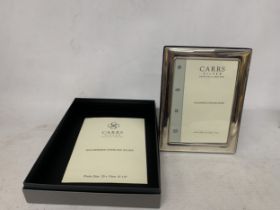 A HALLMARKED SILVER PHOTO FRAME, 18CM X 13CM BOXED