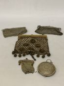 TWO VINTAGE METAL MESH EVENING BAGS ONE WITH AN ORNATE EMBOSSED METAL FRAME BOTH WITH KISS-LOCK