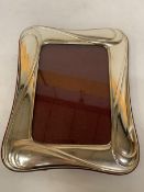 A STAMPED 925 SILVER PHOTO FRAME, 25CM X 20CM