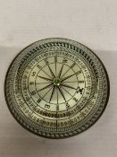 A BRASS GLASS COMPASS