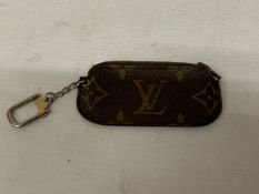 A BELIEVED TO BE LOUIS VUITTON MONOGRAM CANVAS CLES KEY HOLDER