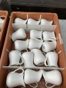 FIFTEEN WHITE JUGS IN CRATE