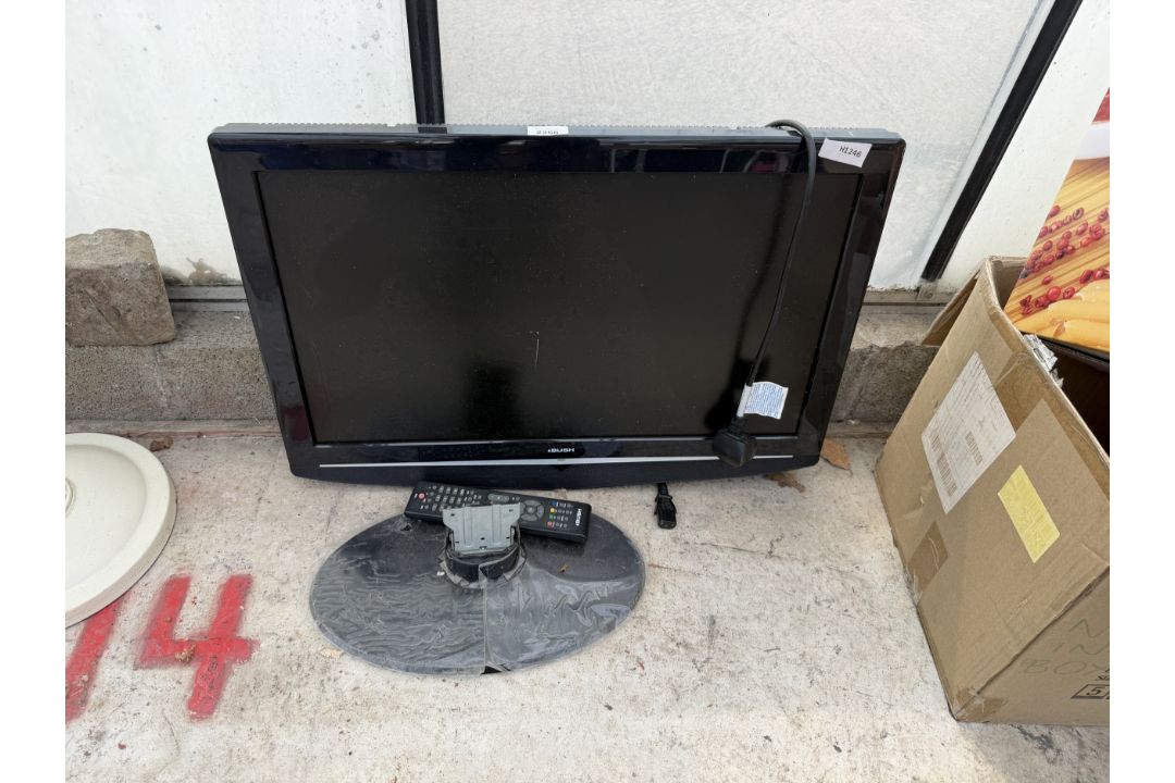 A BUSH 26" TELEVISION WITH REMOTE CONTROL - Image 1 of 3