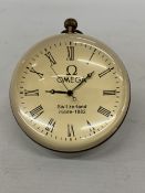 AN OMEGAL GLASS AND BRASS BALL CLOCK