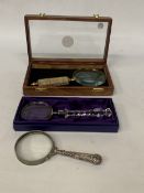 THREE MAGNIFYING GLASSES TO INCLUDE A BOXED EDINBURGH CRYSTAL, BOXED UNIQUELY INDIA AND ONE OTHER