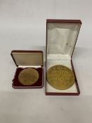 A GILDED FRENCH BARRISTER'S MEDAL DESIGNED BY ALBERT DE JAEGER TOGETHER WITH A COMMEMORATIIVE