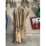 A BUNDLE OF WOODEN STAIR RODS