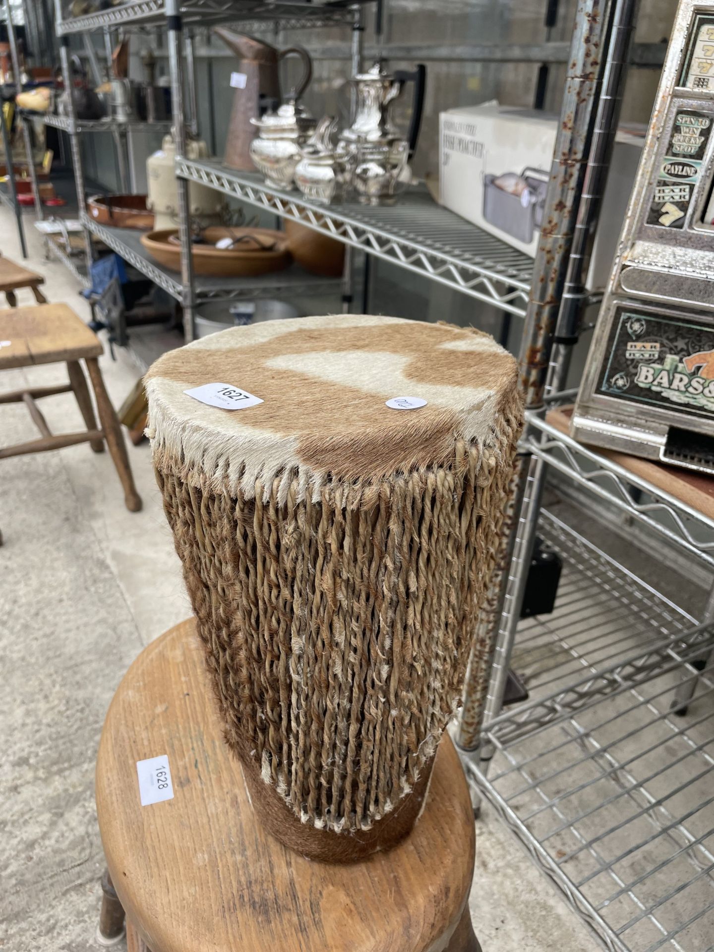 A WOODEN BONGO DRUM