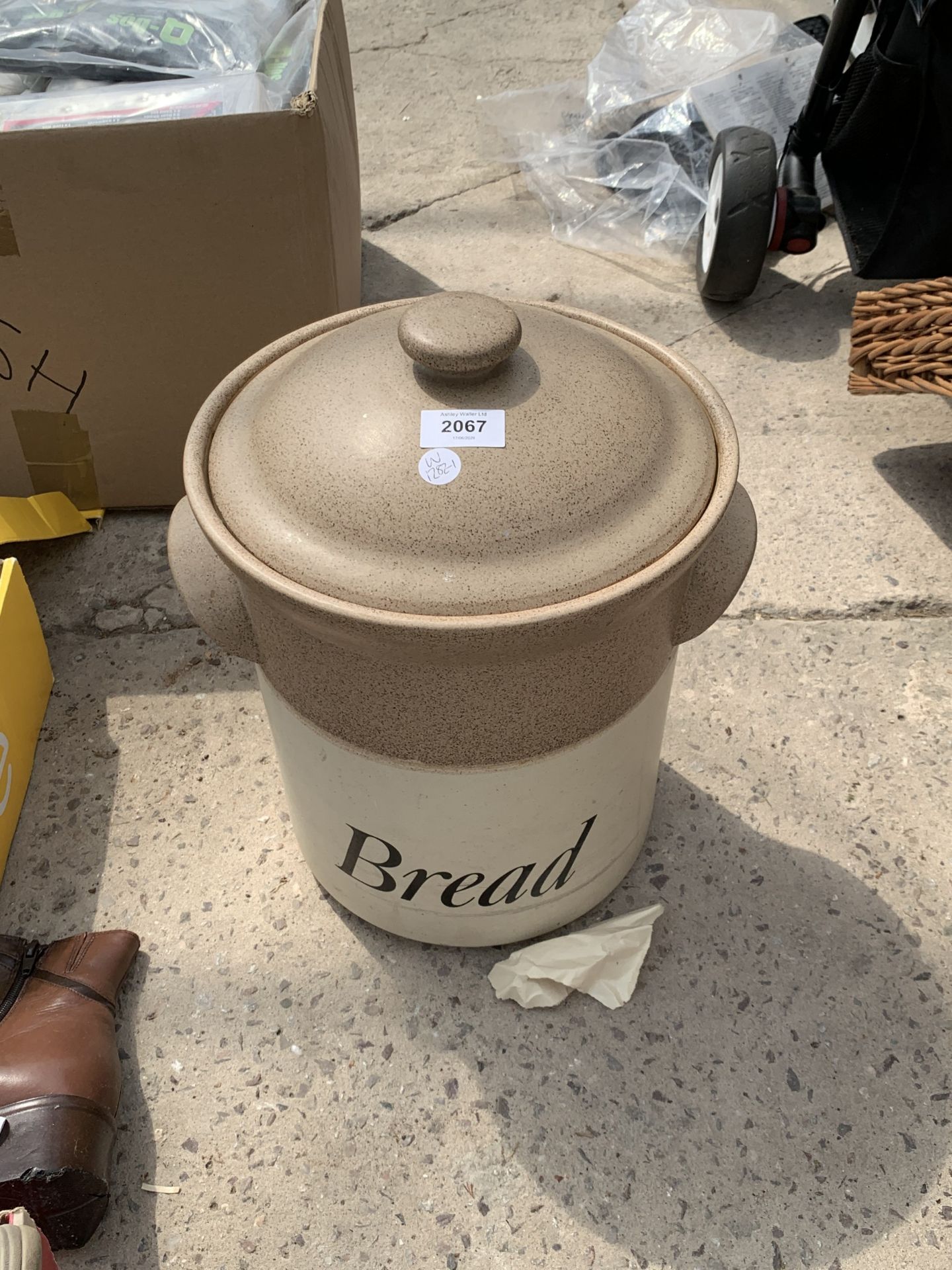 A STONEWARE LIDDED BREAD BIN