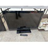 A SONY 37" TELEVISION WITH REMOTE CONTROL