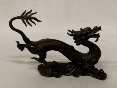 A CHINESE STYLE BRONZE DRAGON SCULPTURE