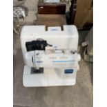 A BROTHER STAR 110 ELECTRIC SEWING MACHINE WITH CARRY CASE