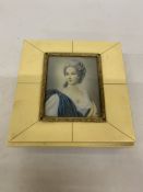 A SWISS MUSICAL MOVEMENT BOX WITH A FRAMED MINIATURE PORTRAIT ON THE LID STYLED WITH FINE INLAID
