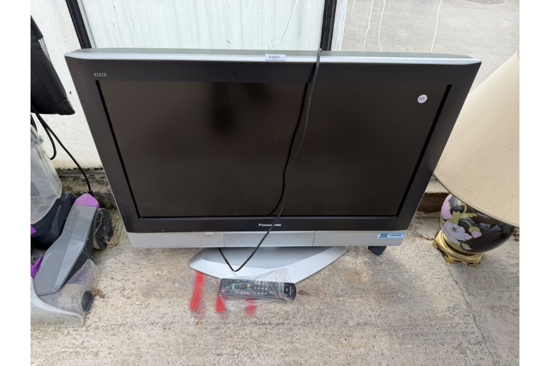 A PANASONIC 32" TELEVISION WITH REMOTE CONTROL - Image 1 of 3