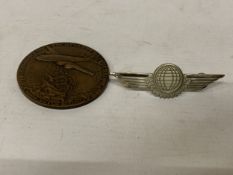 A BRONZE MEDAL COMMEMORATING THE 30TH ANNIVERSARY OF KLM ROYAL DUTCH AIRLINES (1919-1949) DESIGNED