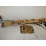 A VINTAGE MILITARY CAMP BED AND A SURGICAL KIT