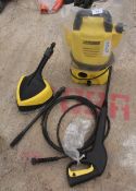 A KARCHER K2 PRESSURE WASHER WITH ATTACHMENTS NO VAT